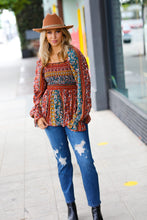 Load image into Gallery viewer, Teal &amp; Rust Smocked Floral Ruffle Hem Top