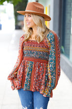 Load image into Gallery viewer, Teal &amp; Rust Smocked Floral Ruffle Hem Top